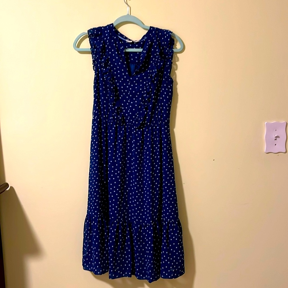 Pretty navy dress with ruffle front and white polkadots